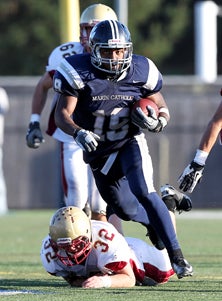 Akili Terry has had to run over
some would-be tacklers to get
where he needs to go.