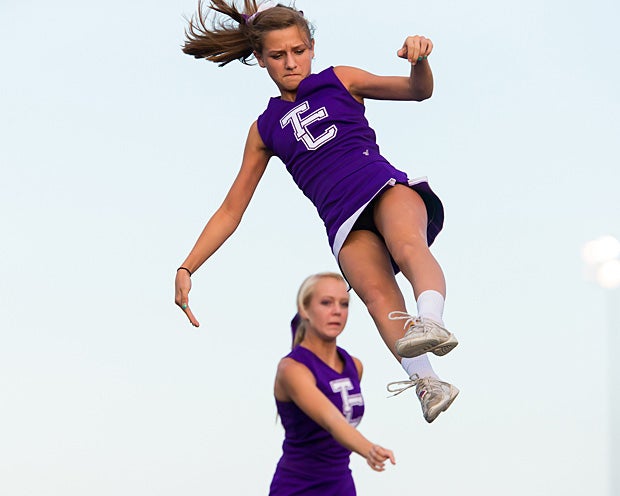 Another Timber Creek cheerleader flies through the air.