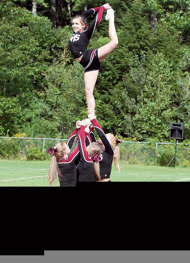 The Goffstown (New Hampshire) cheerleaders pull off a unique formation to root on their team.