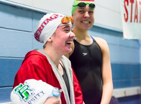 After winning last year, Heritage junior Kylie Andrews, center, is one of the favorites in the Class 5A 100-yard freestyle this season. Colorado features a list of standouts in the event. 
