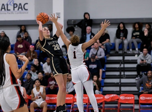 Archbishop Mitty's McKenna Woliczko goes up for two of her game-high 19 in the Nike TOC finals as the No. 3 Monarchs beat No. 1 Long Island Lutheran 73-72. (Photo: Darin Sicurello)