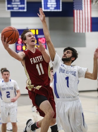 Faith Christian and senior Benjamin Hawkins, left, enter
the Class 3A state tournament on a roll after winning the
Metro League districts.