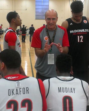 Allocco with a group of his players during a Mondayworkout. The players enjoyed the structured "De LaSalle" practice.