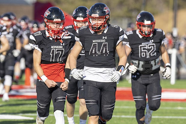 Muskego takes the field last November for a game against Hudson. The Warriors enter the season riding a 37-game win streak.