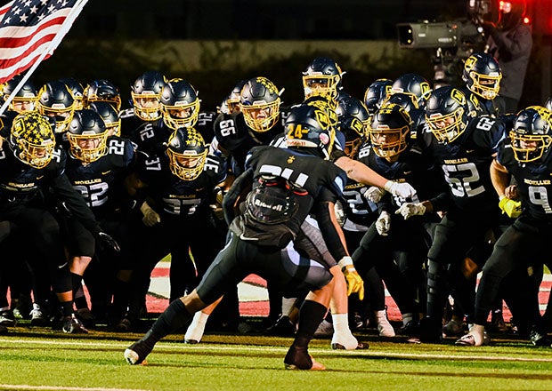Taking the field here in last season's Division I playoffs in Ohio, Archbishop Moeller has won a state title in six straight decades. (Photo: Jenny Walters)