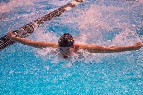 Junior Laurel Eiber of Arapahoe enters the Class 5A state swim meet on a roll after breaking the 50-yard freestyle record of U.S. Olympian Amy Van Dyken-Rouen at the Centennial League championships. Fossil Ridge is the defending state champion in 5A, Evergreen in 4A.