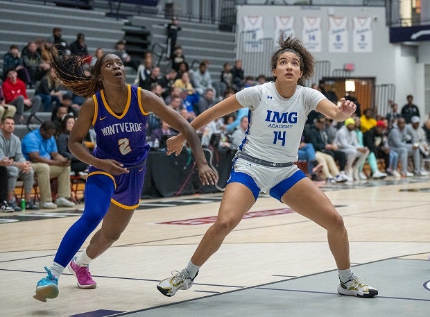 Montverde's Vivian Iwuchukwu battles with IMG Academy's Heloisa Carrera on Saturday in the Chipotle Nationals final. Iwuchukwu, a USC commit, had 17 points. (Photo: Julie Brown)