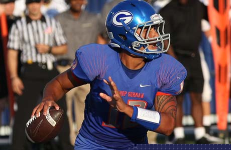 Bishop Gorman quarterback Jarrett Solomon threw for three touchdowns and ran for another in his team's season-opening victory against Good Counsel.