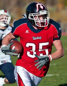 At 6-8, 210, Springville's Matt
Sumsion is a load to bring down.