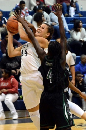 The 6-foot-1 Williams plays basketball nine months
of the year, playing for school and AAU.