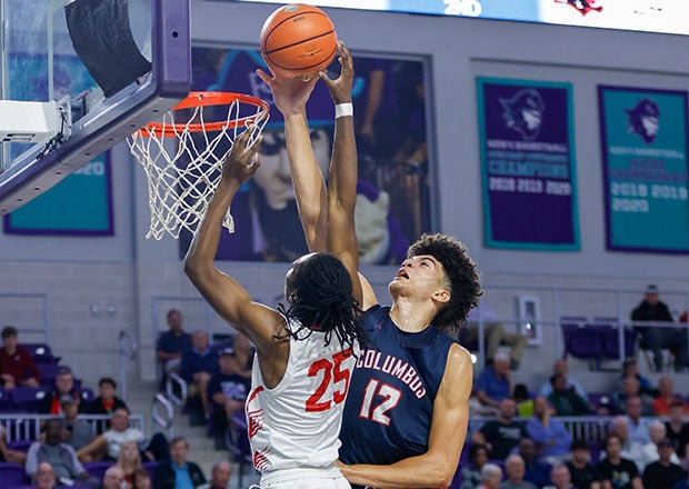 Columbus sophomore Cameron Boozer goes up for a block on Imhotep Charter's Jeremiah White on Wednesday in the City of Palms final. (Photo: Pete Wright)
