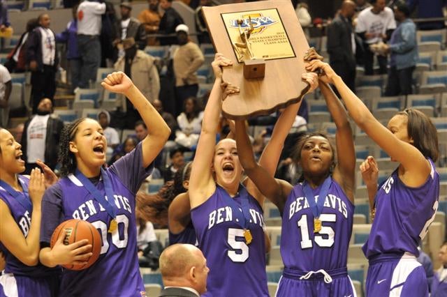 Ben Davis players celebrate their second straight undefeated state championship season.