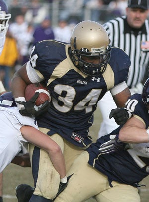 Adonis Ameen Moore rushed for 131 yards and three TDs.