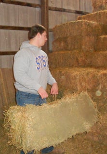 Throwing around hay bales has helped
Nathan Bazata with his strength. He
can bench press 385 pounds.