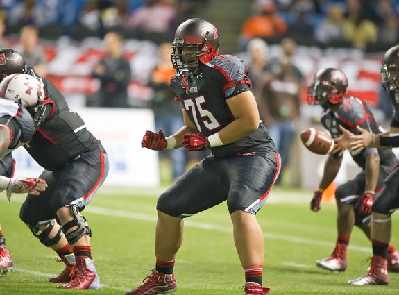Andrus Peat has family and friendship ties to Nebraska. But the towering tackle also could get a Stanford education if he so chooses.