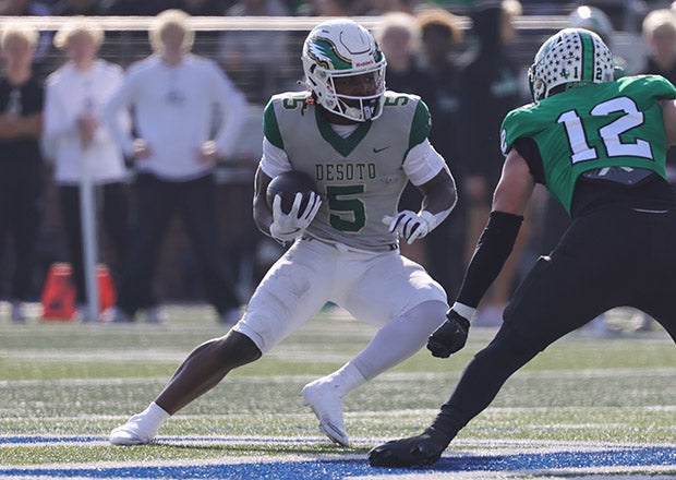 A week after scoring seven touchdowns in a playoff win, junior running back SaRod Baker had another big game for DeSoto. (PHOTO: Jay Hinton)