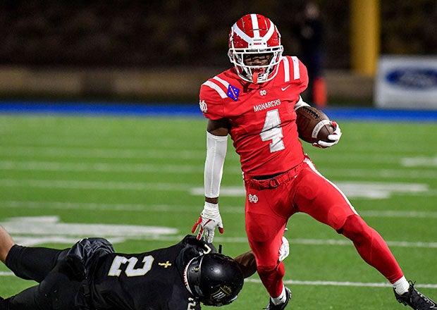 Oklahoma-bound running back Raleek Brown of Mater Dei evades a Servite defender Saturday night.