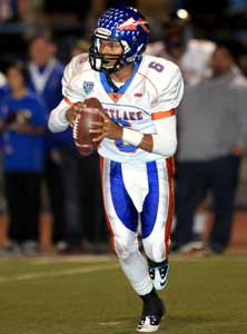 Justin Moore was the other spectacular
force for Westlake, passing and rushing
for a combined 252 yards and three TDs.