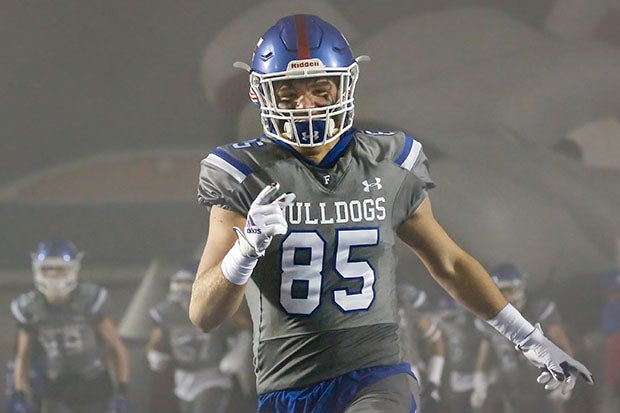 Walker Lyons takes the field for a Sac-Joaquin Section playoff game last November.