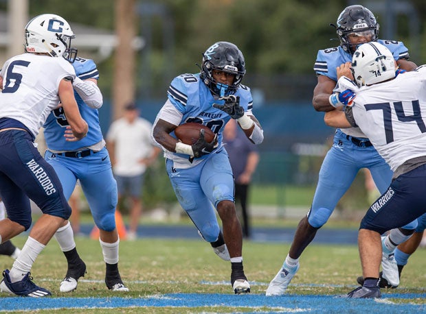 Travis Bates (20) is one of two main running threats for Berkeley Prep. 