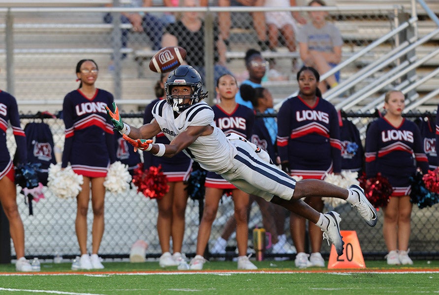 Faruq Muhammad of Sierra Canyon lays out for a catch Thursday against Chaminade-Madonna. The senior made the grab but it was nullified by a penalty. (PHOTO: Jeff Klein)