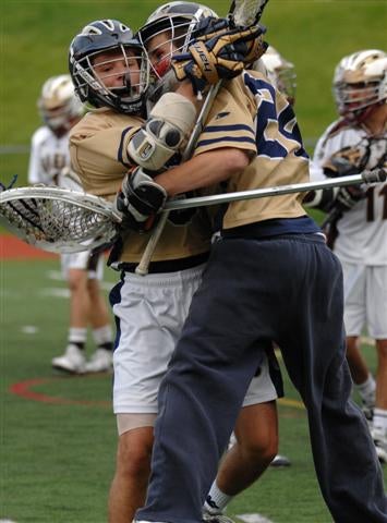 Rye Country Day goalie Chandler Grinnel (24) celebrates goal vs. Iona Prep.
