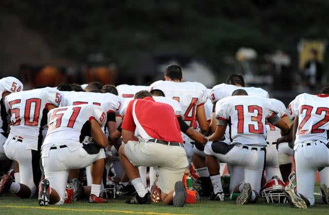 Team honoring Kevin following Woodbridge game.