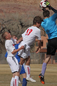Jacob Francis (13) on the soccer field.