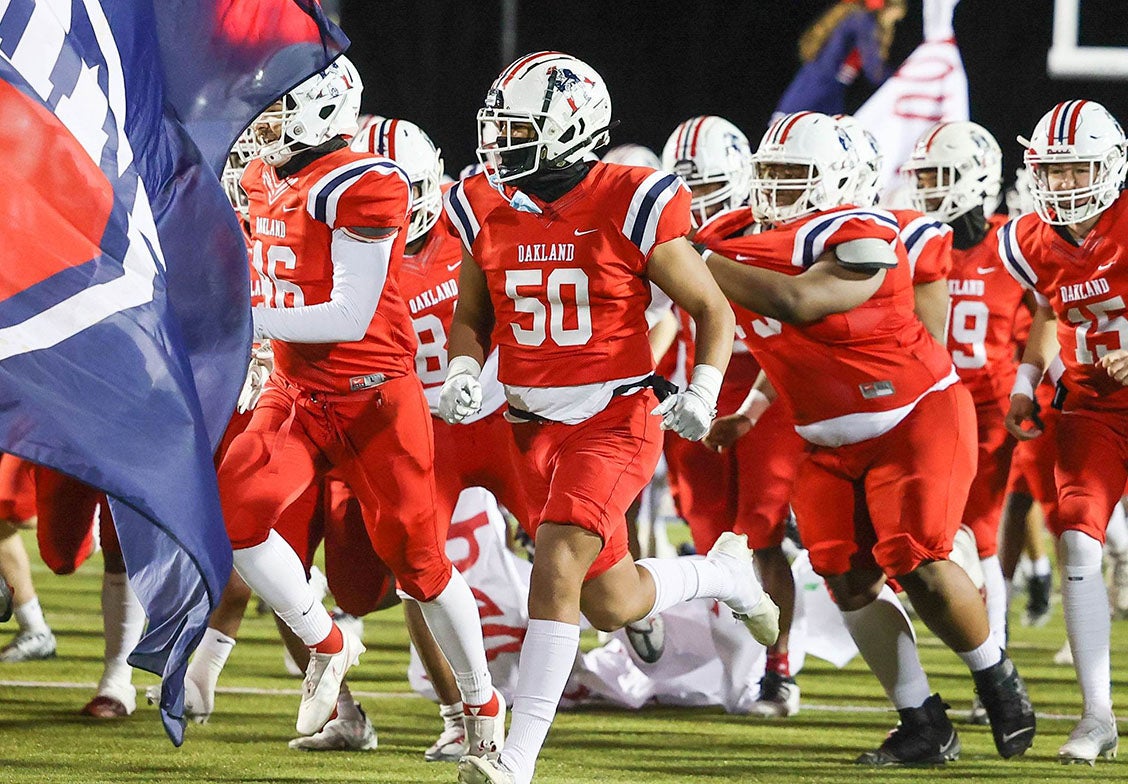 Under head coach Kevin Creasy, Oakland has won three-straight state championships by an average score of 47-22. The Patriots have finished in the state top 10 every season over the past decade. (Photo: Carl Edmondson Jr.)