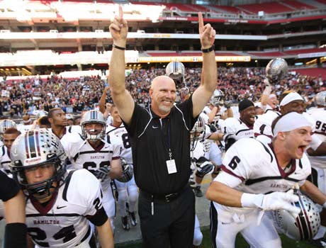 Hamilton coach Steve Belles celebrates 12th straight victory and seven Arizona State Division I title following a 31-16 triumph over Mountain Pointe at University of Phoenix Stadium. 