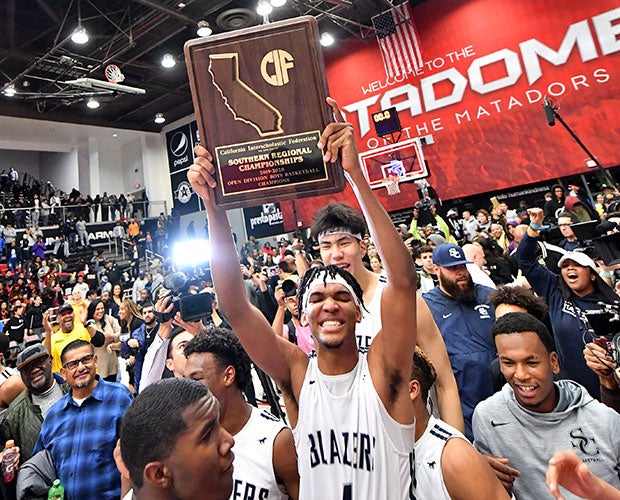 Ziaire Williams proudly displays the CIF Southern Regional championship plaque.