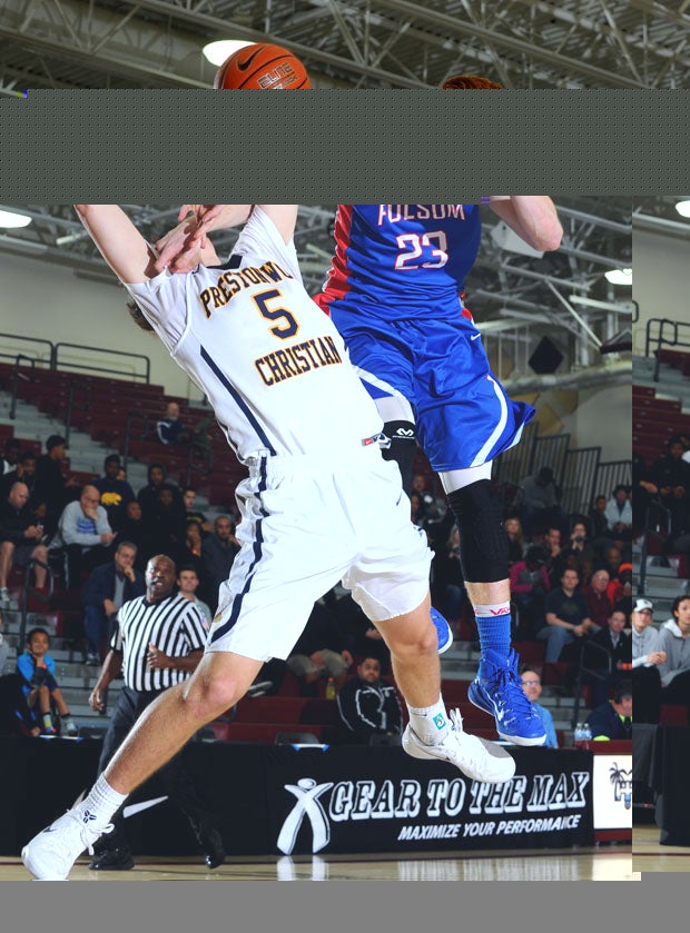 Folsom's Jared Wall (23) tangles with Evan Peters, of Prestonwood.