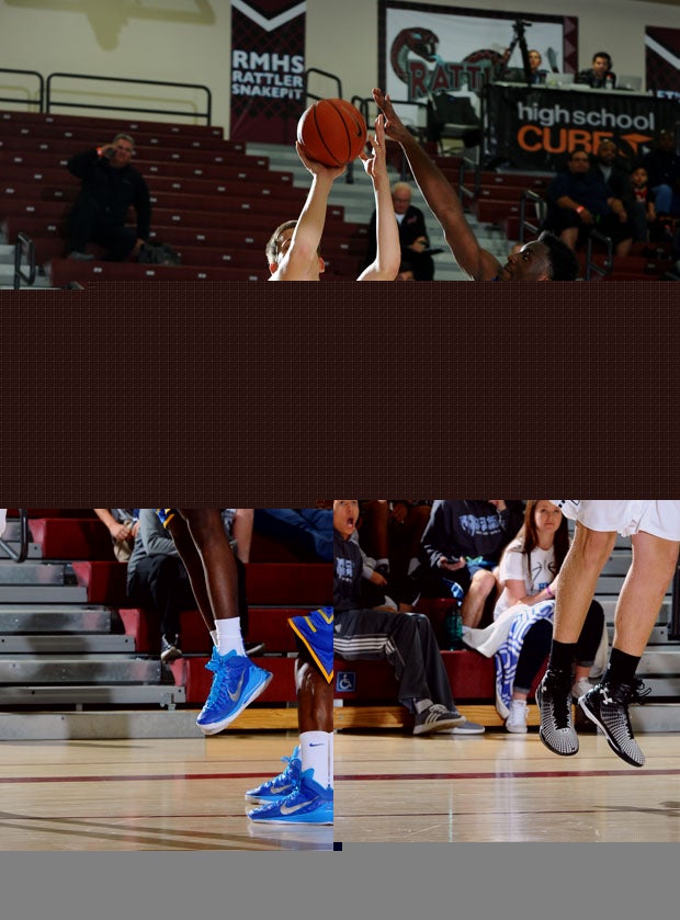 Oakley College's Dimitrje Nikolic, a 6-10 wing who scored 25 points, is being contested by Damien's Jeremy Hemsley.