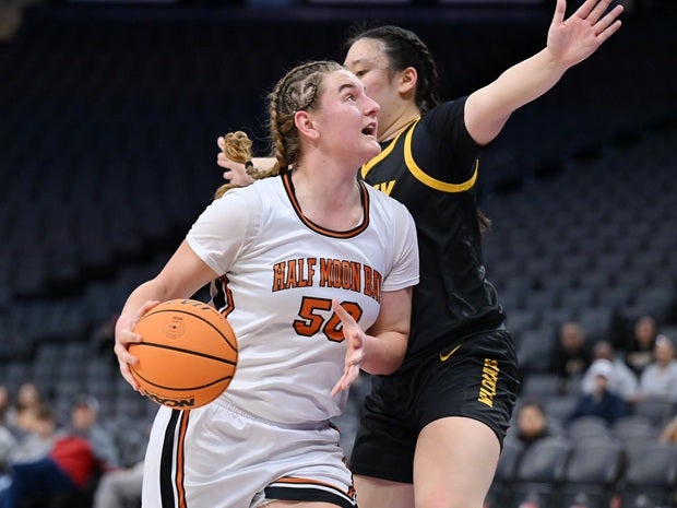 Half Moon Bay's Zoey Lemoge scored a game-high 18 points and grabbed 18 rebounds in a losing effort for the Cougars. (PHOTO: David Steutel)