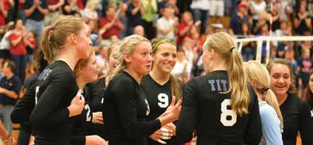 Amber Rolfzen (5), Whitney Kostal (2), Kelly Hunter (3), Katie Kurtz (9) and Megan Stroyek (8) all celebrate a Papillion-LaVista South victory in a titanic regular-season matchup.