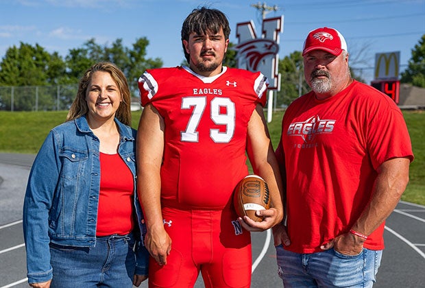 Jackson Cantwell with parents Christian and Teri, both highly-accomplished athletes in their own right. (PHOTO: Claudia Rozell)
