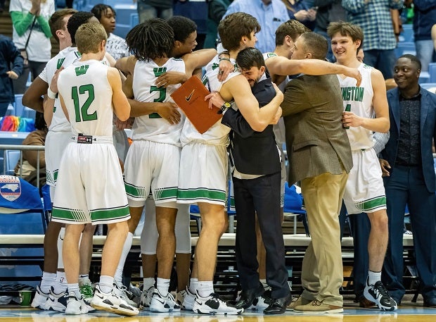 Weddington players celebrate their North Carolina 4A title after beating Panther Creek 76-58.