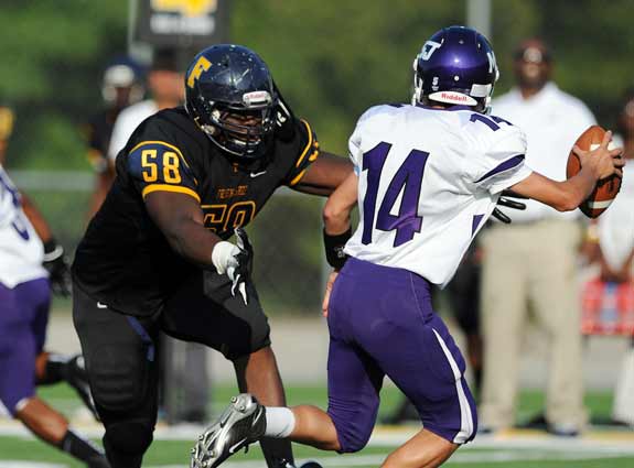 Uncommitted defensive tackle Eddie Goldman fights through double- and triple-teams yet still racks up tackles and sacks.