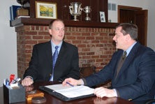 Coach Alan Huss, left, and HeadmasterMichael Kennedy.