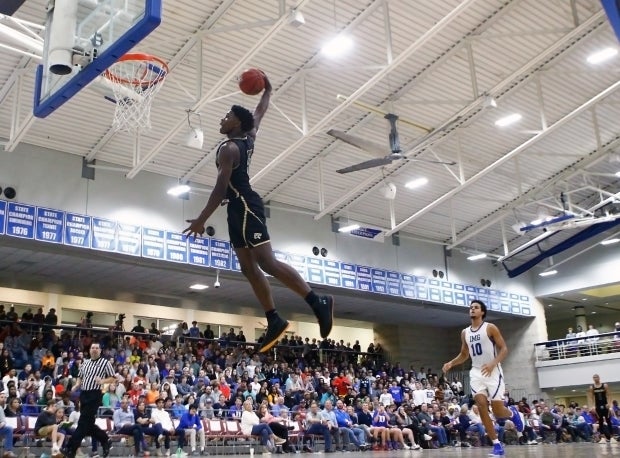 Edwards rises for a dunk against IMG Academy.