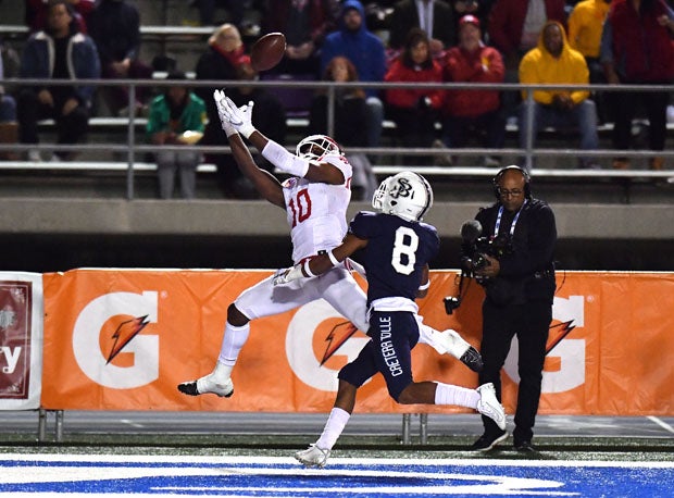 Kyron Ware-Hudson with one of his two touchdown grabs for Mater Dei.