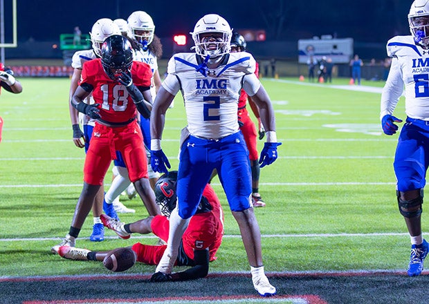 IMG Academy running back Le'Khy Thompkins celebrates a touchdown against Phenix City Central last month. The Louisville-bound senior finished the season with 982 yards and nine touchdowns on just 115 carries. (PHOTO: Corey Jones)