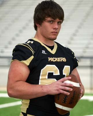 Travis Register will move from the defensive line to guardthis season.
