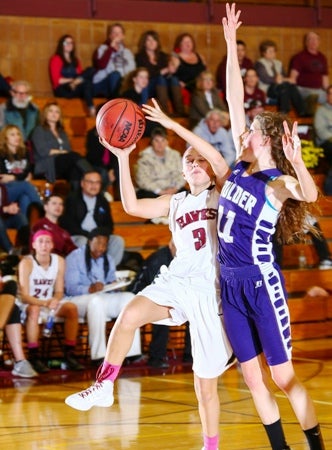 Horizon guard Kylie Jimenez, left, is one of the state's
best. The Hawks will face a streaking Pine Creek team
in the Class 5A Sweet 16. The Class 4A tournament
resumes March 4, when the 3A bracket also starts. 