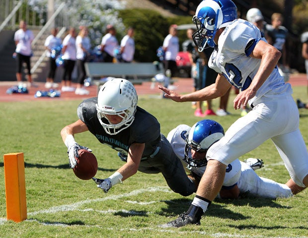 Chadwick (Calif.) quarterback Kevin Ulman dives for the goal line against Cate. 
