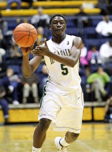 De La Salle's Amadi Udenyi isn't just
a pass-first point guard any more.