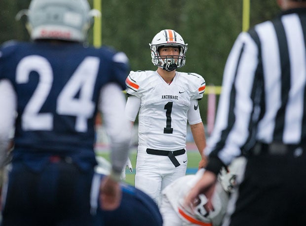 West quarterback Bubba Mendoza stepping to line just before the final play. 