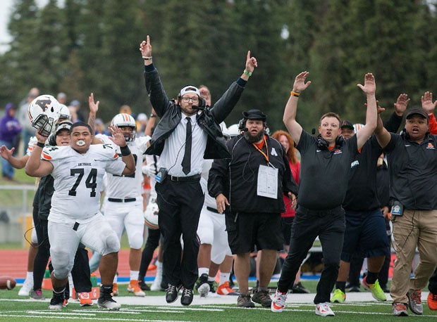 West bench erupts after the game-winning touchdown.