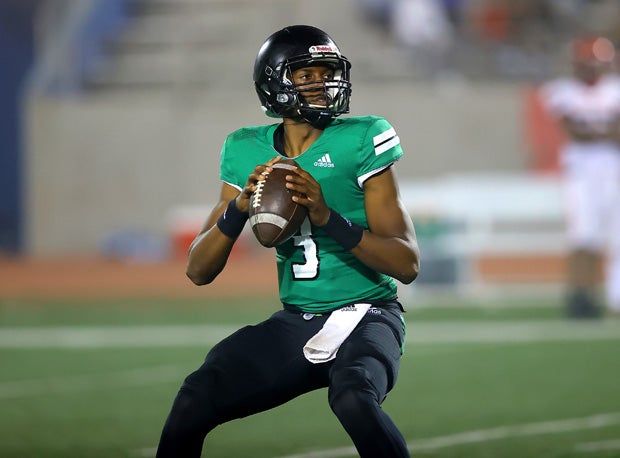 Inglewood senior quarterback Justyn Martin is locked in on a receiver during Friday's 106-0 win over Morningside. 