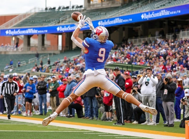 Jaden Greathouse catches one of his two TDs passes in Westlake's 45-14 win over Katy on Saturday.